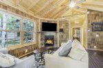 Living room with Smart TV and seasonal gas fireplace
